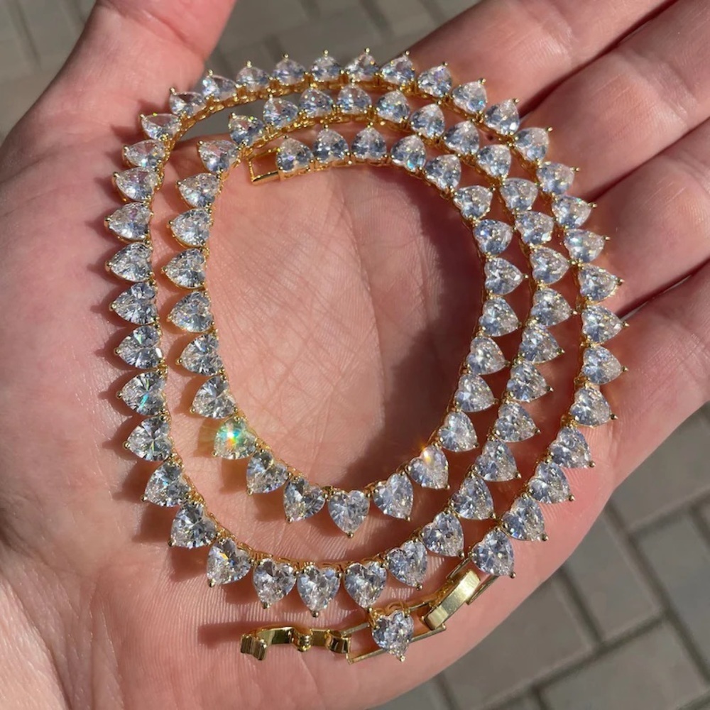 Gold heart tennis chain 16in